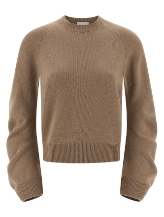 Curved sleeve sweater