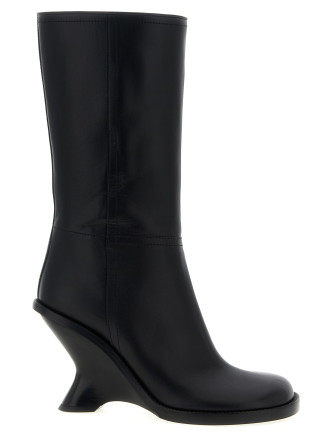 Curved wedge heel boots