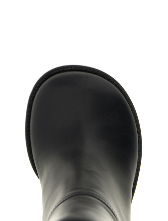 Curved wedge heel boots #