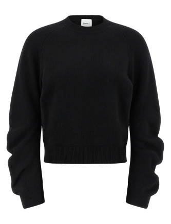 Curved sleeve sweater