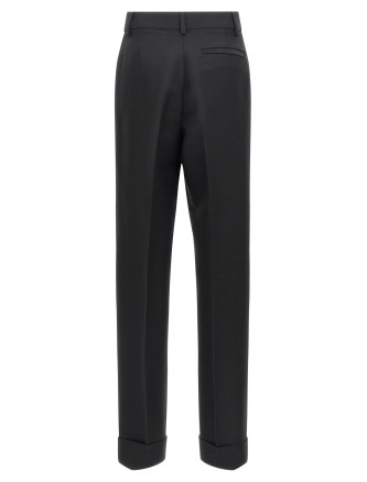 Stretched pleated trousers #