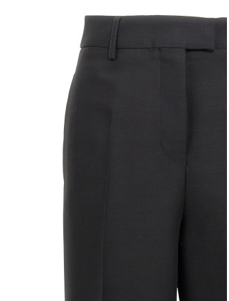 Stretched pleated trousers #