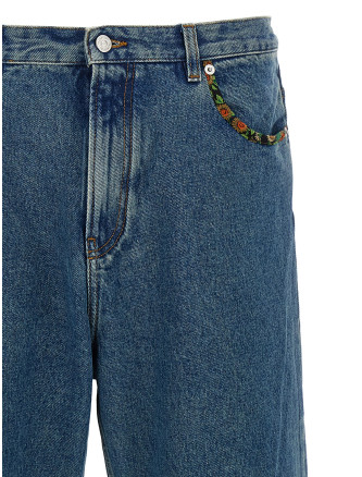 Valentino Garavani floral insert jeans #