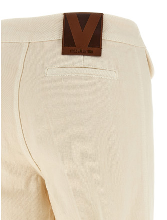 Valentino Garavani 'V' detail jeans #