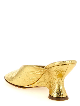 Curved wedge mules #