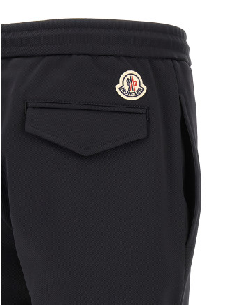 Брюки MONCLER Logo patch joggers (L20912A0003389ALO999) #