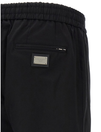 Брюки DOLCE & GABBANA Logo plaque pants (GVZAETGK302N0000) #