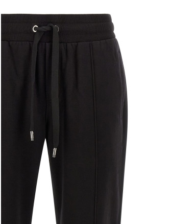 Брюки DOLCE & GABBANA Logo plaque joggers (GP0M5TG7Q2ON0000) #