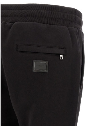 Брюки DOLCE & GABBANA Logo plaque joggers (GP0M5TG7Q2ON0000) #