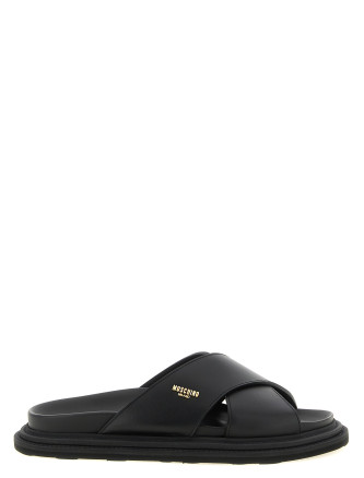Плоские туфли MOSCHINO Leather sabots with logo
